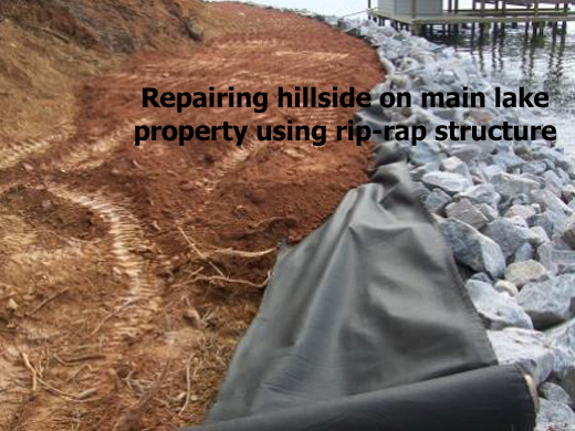 Shoreline Specilists repair hillside on main lake using rip-rap structure
